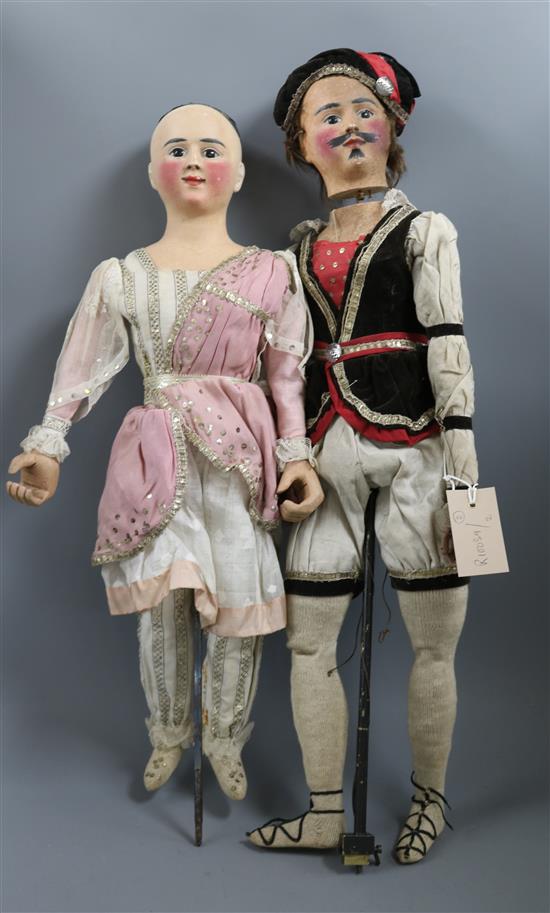 A pair of rare automaton dolls, circa 1840 in original costume from the family of Johann Baptist Taeschler,